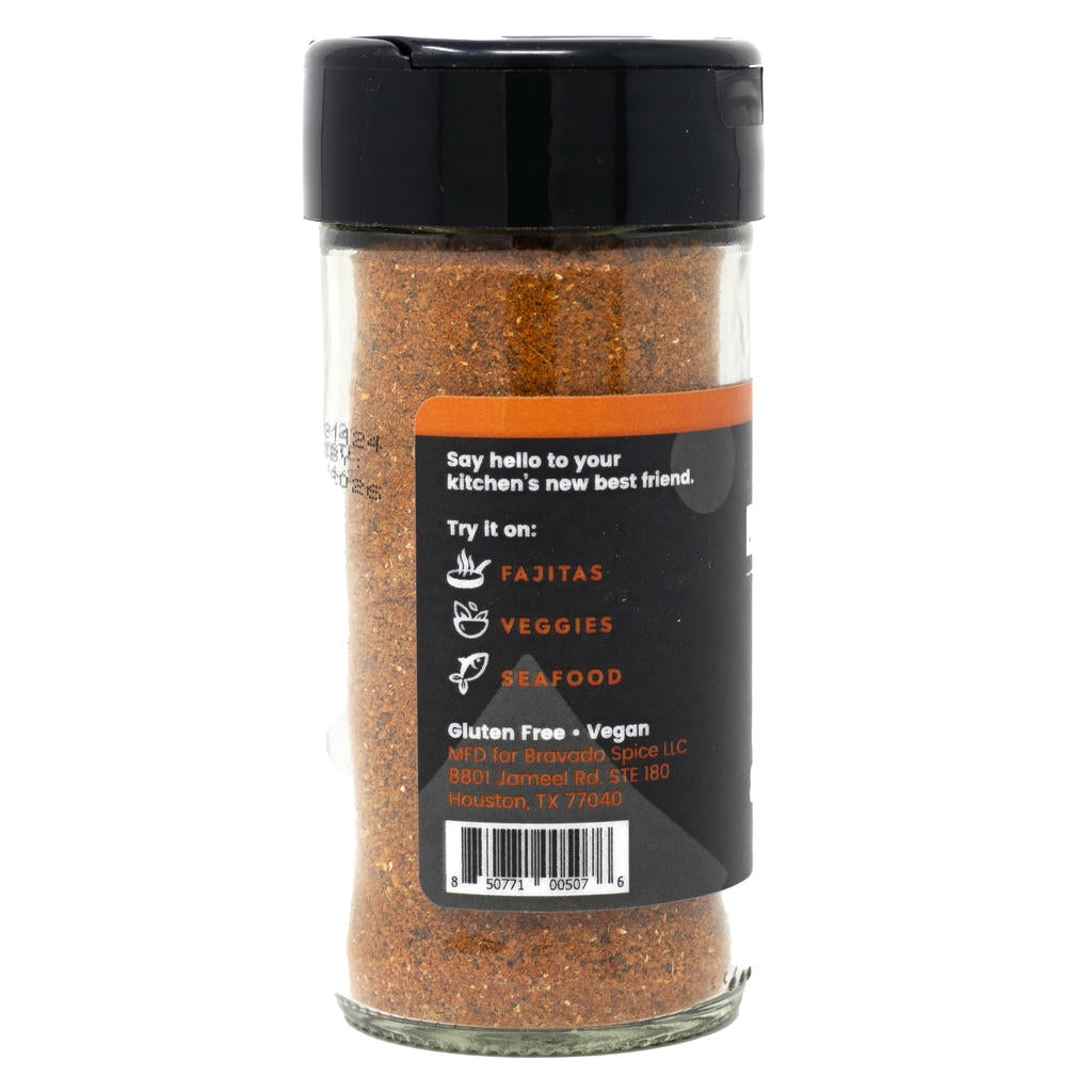 Spice jar with black lid and label on a white background